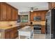 Spacious kitchen featuring modern appliances, ample cabinet space, and a functional island at 800 Isle Of Palms Ct, Fort Mill, SC 29708
