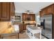 Updated kitchen showcases granite counters, stainless appliances, and a convenient center island at 800 Isle Of Palms Ct, Fort Mill, SC 29708
