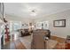 Spacious living room with hardwood floors, fireplace, and an open layout at 800 Isle Of Palms Ct, Fort Mill, SC 29708