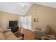 Living room with vaulted ceilings and hardwood floors at 800 Isle Of Palms Ct, Fort Mill, SC 29708