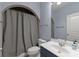 Bathroom with neutral colors, shower/bath, and lots of natural light at 8813 Covey Rise Ct, Charlotte, NC 28226