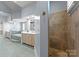 Bathroom with a shower, double vanity, and tub at 8813 Covey Rise Ct, Charlotte, NC 28226