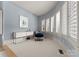 Sitting area with curved wall, chair, and plenty of natural light at 8813 Covey Rise Ct, Charlotte, NC 28226