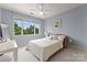 Bedroom with large window with lots of natural light and a cozy feel at 8813 Covey Rise Ct, Charlotte, NC 28226