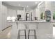 Bright and spacious kitchen with white cabinetry, granite countertops, and modern appliances, perfect for cooking at 8813 Covey Rise Ct, Charlotte, NC 28226