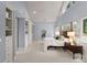 Spacious main bedroom with vaulted ceilings, built-in storage, and large windows at 8813 Covey Rise Ct, Charlotte, NC 28226