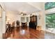 Open-concept dining area with natural light and wood floors, perfect for entertaining at 8968 St Croix Ln, Charlotte, NC 28277