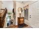 Charming entryway showcasing a staircase, decorative furnishings, and a welcoming view into the living space at 8968 St Croix Ln, Charlotte, NC 28277