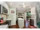 Well-lit kitchen featuring a center island, stainless steel appliances, and hardwood floors at 8968 St Croix Ln, Charlotte, NC 28277