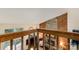 A living room featuring stone fireplace, wood paneling, and natural light at 8968 St Croix Ln, Charlotte, NC 28277