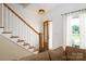 Elegant entryway with a staircase and a stylish front door at 943 Shinnville Rd, Mooresville, NC 28115