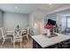 Bright dining area next to kitchen features a modern table and chairs at 954 Taybyn Rd, Fort Mill, SC 29715