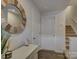 Inviting foyer area with a decorative mirror, a stylish cabinet, and wood-look flooring at 954 Taybyn Rd, Fort Mill, SC 29715