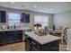 Open kitchen area featuring stainless steel dishwasher, and view of the dining area at 954 Taybyn Rd, Fort Mill, SC 29715