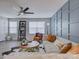 Bright living room featuring a ceiling fan, modern decor, and ample natural light at 954 Taybyn Rd, Fort Mill, SC 29715