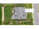 An aerial view of the home showing the roof, patio, and backyard at 9833 Ardley Park Way, Mint Hill, NC 28227