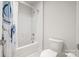 Clean white bathroom with a toilet and shower/bathtub combination at 9833 Ardley Park Way, Mint Hill, NC 28227