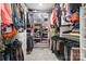 Walk-in closet with custom shelving and hanging storage for optimal organization at 9833 Ardley Park Way, Mint Hill, NC 28227