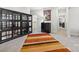 Hallway featuring dark cabinets with a multicolored carpet at 9833 Ardley Park Way, Mint Hill, NC 28227