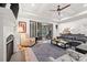 Spacious living room with fireplace, large sliding glass doors, and plenty of seating at 9833 Ardley Park Way, Mint Hill, NC 28227