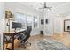 Bright office space with hardwood floors, shutters, and modern lighting, creating an ideal work environment at 9833 Ardley Park Way, Mint Hill, NC 28227