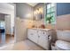 Traditional bathroom featuring neutral tile, a window and a white vanity at 1010 Forest Dr, Lancaster, SC 29720