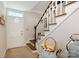 Bright entryway features white trim staircase, with wood steps, and natural light at 1010 Forest Dr, Lancaster, SC 29720