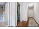 Hallway with hardwood flooring, and access to several rooms in the home at 1010 Forest Dr, Lancaster, SC 29720