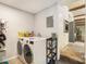 Functional laundry room with washer, dryer, and storage, conveniently located near the kitchen at 1010 Forest Dr, Lancaster, SC 29720