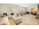 Spacious living room featuring neutral carpet, large bay window, and natural light at 1010 Forest Dr, Lancaster, SC 29720