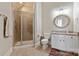Bathroom with a glass shower, vanity, and bright lighting at 1032 Seminole Dr, Waxhaw, NC 28173