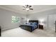 Comfortable bedroom featuring a ceiling fan, a large window and neutral wall colors at 1032 Seminole Dr, Waxhaw, NC 28173