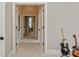 Hallway with white trim and doors, leading to different rooms in the house at 1032 Seminole Dr, Waxhaw, NC 28173