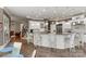 A kitchen with a large island and breakfast bar, with seating for four at 1032 Seminole Dr, Waxhaw, NC 28173