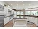 A kitchen with custom cabinets, stainless appliances, and granite countertops at 1032 Seminole Dr, Waxhaw, NC 28173