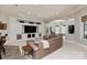 Finished basement with a living room area including a mounted TV, built-ins, and a comfy sofa at 1032 Seminole Dr, Waxhaw, NC 28173