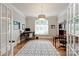 Bright home office with hardwood floors, large window, and ample workspace at 1032 Seminole Dr, Waxhaw, NC 28173