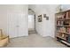 Bedroom with carpeted floors, a built-in bookshelf, and multiple closets for storage at 11103 Fountaingrove Dr, Charlotte, NC 28262