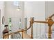Grand foyer features soaring ceilings, a chandelier, and hardwood floors at 11103 Fountaingrove Dr, Charlotte, NC 28262