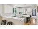 Bright kitchen featuring quartz countertops and stainless steel appliances at 11103 Fountaingrove Dr, Charlotte, NC 28262