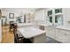Open-concept kitchen features quartz countertops and modern stainless steel appliances at 11103 Fountaingrove Dr, Charlotte, NC 28262