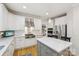 Modern kitchen with stainless steel appliances, quartz counters, and updated cabinetry at 11103 Fountaingrove Dr, Charlotte, NC 28262