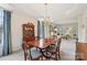 Open-concept living and dining room showcases hardwood floors and natural light at 11103 Fountaingrove Dr, Charlotte, NC 28262