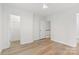 Spacious bedroom featuring an ensuite bathroom, closet, and hardwood style flooring at 1123 Market St, Fort Mill, SC 29708