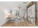 Bright living room features hardwood floors, a decorative fireplace, and a view of the staircase at 1123 Market St, Fort Mill, SC 29708