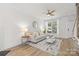 Cozy living room with neutral tones, hardwood floors, and abundant natural light at 1123 Market St, Fort Mill, SC 29708