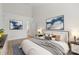 Neutral-toned bedroom with accent art, a comfortable bed, and an ensuite entrance at 1123 Market St, Fort Mill, SC 29708