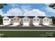 New townhome community features diverse exteriors, private garages, and landscaped front yards at 1237 Margo Mannor Dr, Fort Mill, SC 29708