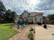 Backyard with an in-ground pool, a patio, and a seating area; great for relaxing at 141 Weathers Creek Rd, Troutman, NC 28166