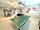 Finished basement featuring a carpeted floor, a ping pong table, and decor at 141 Weathers Creek Rd, Troutman, NC 28166